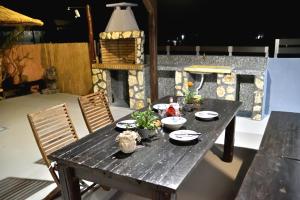 Balkón nebo terasa v ubytování PLUMERIA HOUSE