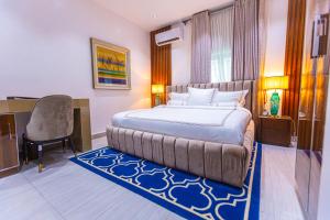 Katil atau katil-katil dalam bilik di Isglo Hotels Ikoyi