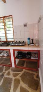 מטבח או מטבחון ב-PWANI HOUSE cottage