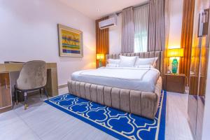 Katil atau katil-katil dalam bilik di Isglo Hotels Ikoyi