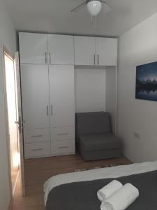 Postel nebo postele na pokoji v ubytování Apartmani NIKA