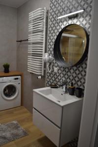Kúpeľňa v ubytovaní Apartamenty DK9 Promenada Gwiazd 14