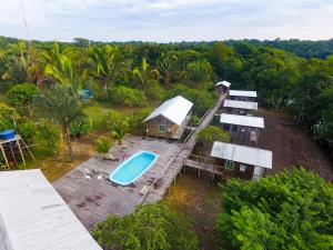 an aerial view of a house with a bath tub at Amazon Boto Lodge Hotel in Careiro