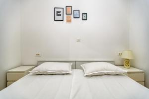 Posteľ alebo postele v izbe v ubytovaní Holiday apartment Zadar - with summer balcony and parking