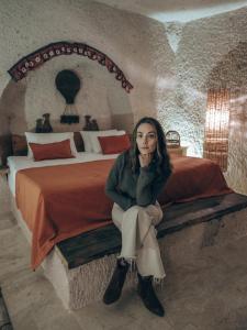 Postel nebo postele na pokoji v ubytování Kalsedon Cave Suites