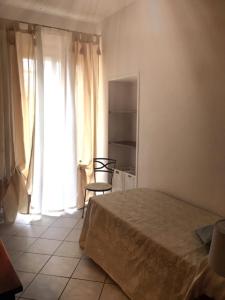 Postel nebo postele na pokoji v ubytování Hotel San Lino