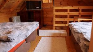 Llit o llits en una habitació de Vikendice Mijajlović 1