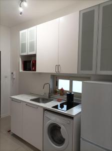 Kuchyň nebo kuchyňský kout v ubytování AmendolaRoom + 15 fotografií