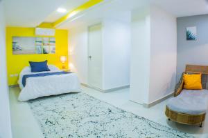 Postel nebo postele na pokoji v ubytování Malecon Premium Rooms & Hotel