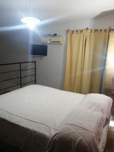 Postel nebo postele na pokoji v ubytování Departamento nazuc