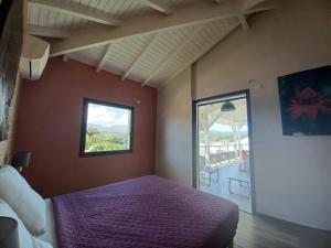 Postel nebo postele na pokoji v ubytování Les Balcons du Parc