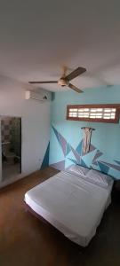Un pat sau paturi într-o cameră la Hostel Villa Mary