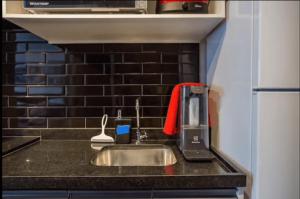 Una cocina o zona de cocina en Studios Sampa - Parque Augusta