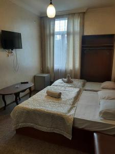 Postel nebo postele na pokoji v ubytování Tokaplus