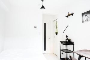 NEST HATAGAYA Stylish Apt電視和／或娛樂中心