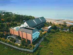 a large building with a train on top of it at THE HAVEN SUITES Bali Berawa in Canggu