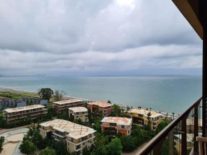 a view of the ocean from a balcony at Dreamland deluxe apartment in Chakvi