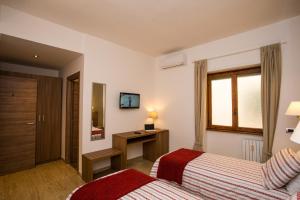 Voodi või voodid majutusasutuse Trastevere's Friends toas