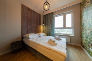 Postel nebo postele na pokoji v ubytování Apartament Luxury Two-bedroom