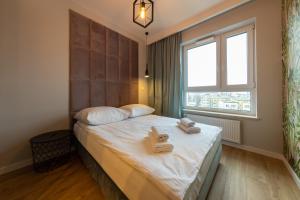 Postel nebo postele na pokoji v ubytování Apartament Luxury Two-bedroom