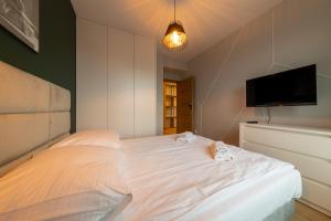 Postel nebo postele na pokoji v ubytování Apartament Luxury Two-bedroom