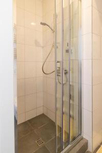 Vonios kambarys apgyvendinimo įstaigoje HOT SPOT Vilnius Apartments!