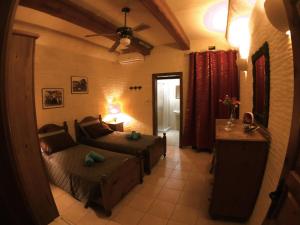 Voodi või voodid majutusasutuse Ad Hoc B&B toas