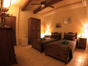 Voodi või voodid majutusasutuse Ad Hoc B&B toas