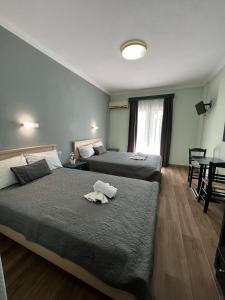 Ένα ή περισσότερα κρεβάτια σε δωμάτιο στο Villa Christin Nei pori