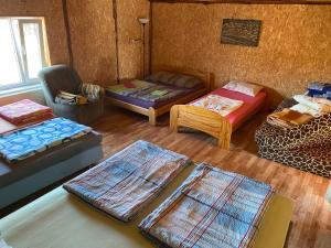 Postel nebo postele na pokoji v ubytování Viesu Māja Arnicāni
