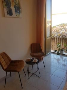 A seating area at BALCONI SU TROPEA