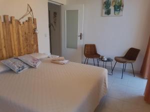A bed or beds in a room at BALCONI SU TROPEA