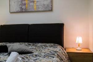 Łóżko lub łóżka w pokoju w obiekcie Diana Holiday Home