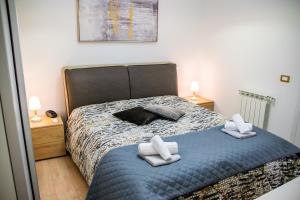 Łóżko lub łóżka w pokoju w obiekcie Diana Holiday Home
