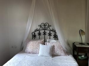 A bed or beds in a room at Villa Katia with Sea view, Pourion, Zagora