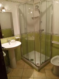 a bathroom with a shower and a sink at La Giara B&B in San Demetrio Corone +46 photos