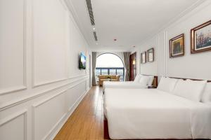 Ліжко або ліжка в номері Menora Grand Da Nang