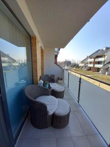 En balkon eller terrasse på Apartament Jantar Park