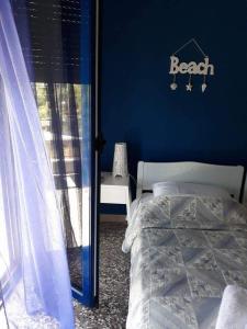 Postel nebo postele na pokoji v ubytování Meerithic ROKKA ROOMS
