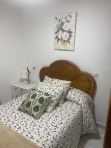Un pat sau paturi într-o cameră la Casa Rural La Corrada