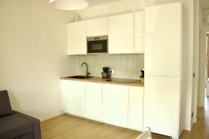 A kitchen or kitchenette at Appartamento Katia