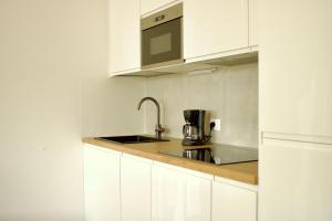 A kitchen or kitchenette at Appartamento Katia