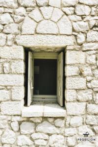 Fotografie z fotogalerie ubytování Prosilion Stone House v destinaci Agriliá