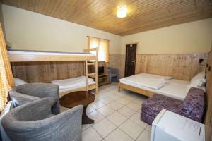 Postel nebo postele na pokoji v ubytování Chatový areál Zděřina