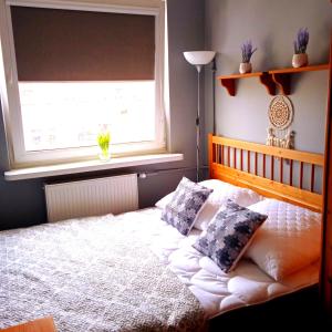 Ένα ή περισσότερα κρεβάτια σε δωμάτιο στο 3 Rybacka