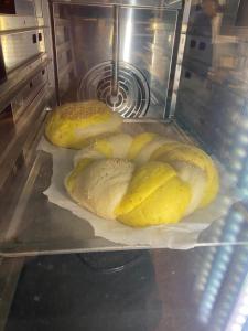 a group of bread sitting in an oven at La Casa del Limoneto in Favignana