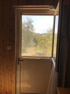 Fotografie z fotogalerie ubytování Pervolaris Cottages 1 v destinaci Goudhi