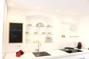 A kitchen or kitchenette at Dolce Loft