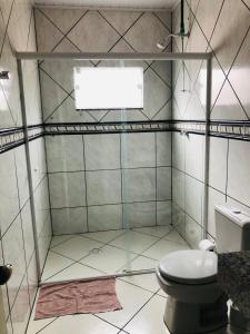 Ett badrum på Pousada Central