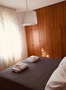 Кровать или кровати в номере Paradiso sul lago